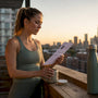 Runner reviewing Informed Sport certification at kitchen table