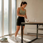 Runner about to take magnesium supplement capsule
