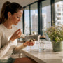 Runner taking magnesium capsule with breakfast