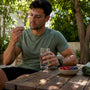 Runner taking magnesium capsule at home