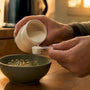 Hand scooping magnesium powder and capsules