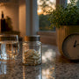 Morning magnesium supplement with water and clock