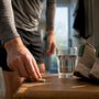 Runner preparing a daily supplement routine