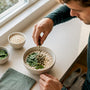 Runner adding seeds to magnesium-rich breakfast