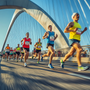 Runners in colourful vests crossing a bridge during the Great North Run 2026